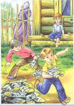 Дети складывают дрова в поленницу.